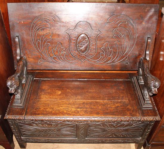 Carved oak monks bench